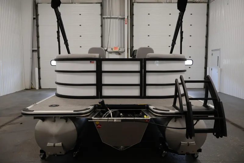 Slide: The Image of 2026 Bentley Pontoons Legacy 200 Navigator in a spacious indoor setting. - 5