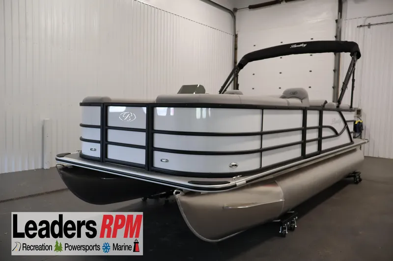 The Image of 2026 Bentley Pontoons Legacy 200 Navigator in showroom, featuring sleek design and modern amenities. - 0