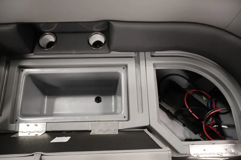 Slide: The Image of Interior of 2026 Bentley Pontoons Legacy 200 Navigator with storage compartments and cup holders. - 31