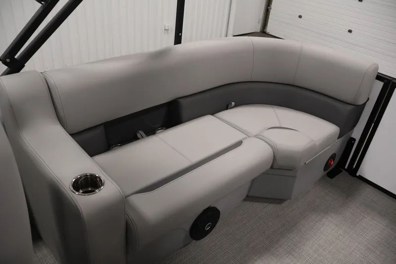 Slide: The Image of 2026 Bentley Pontoons Legacy 200 Navigator interior with plush gray seating and cup holder. - 30