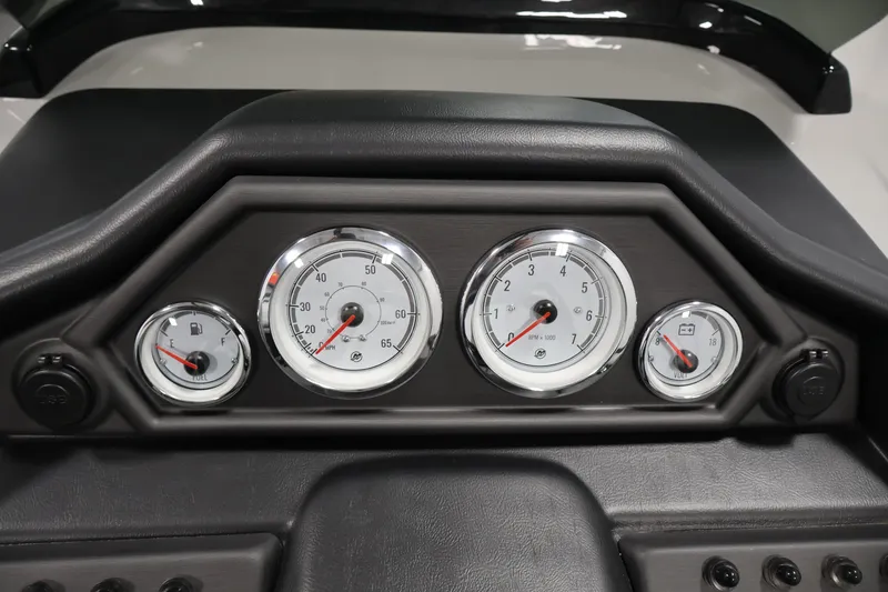 Slide: The Image of Dashboard of 2026 Bentley Pontoons Legacy 200 Navigator with gauges and controls. - 19