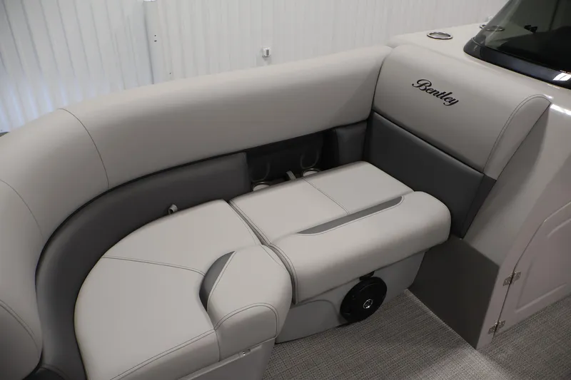 Slide: The Image of Luxurious seating in the 2026 Bentley Pontoons Legacy 200 Navigator, featuring elegant upholstery. - 13