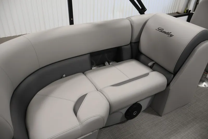 Slide: The Image of 2026 Bentley Pontoons Legacy 200 Navigator interior with luxurious gray seating. - 27