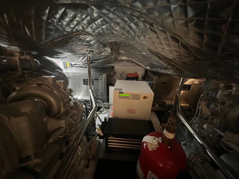 Slide: The Image of Engine room of 2017 Pershing 92 Motor Yacht, featuring machinery and equipment. - 15