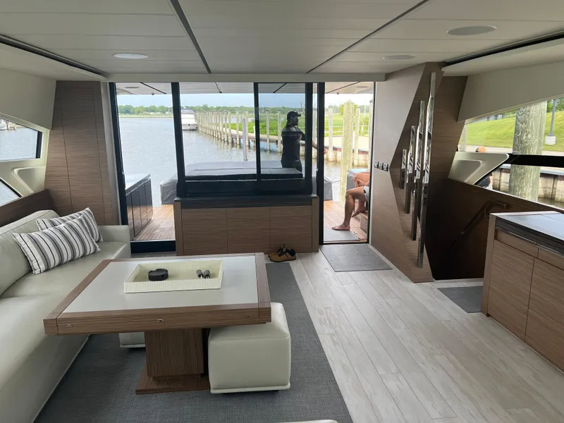 Slide: The Image of Luxurious interior of 2017 Pershing 92 Motor Yacht with modern furnishings and lake view. - 31