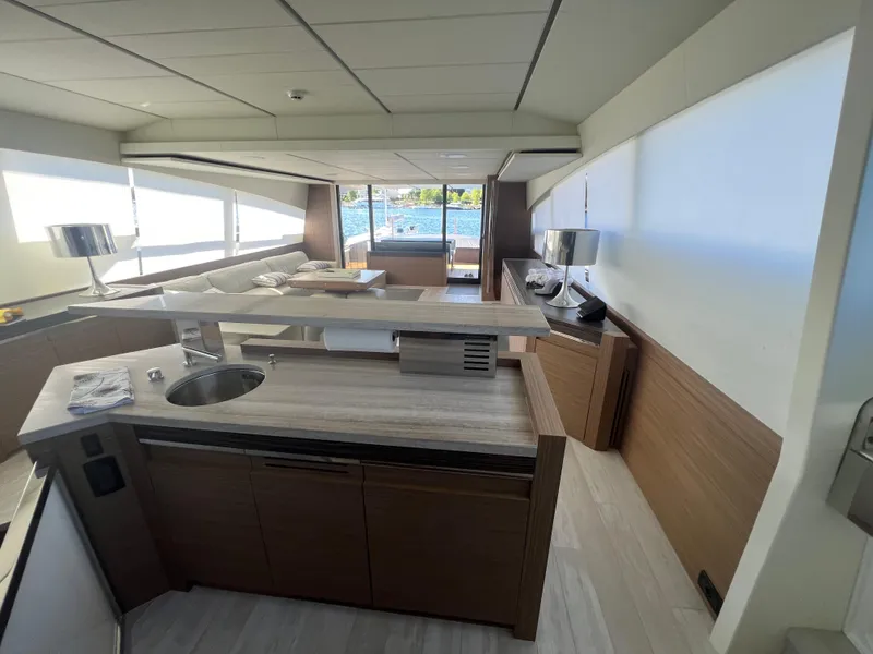 Slide: The Image of Interior of 2017 Pershing 92 Motor Yacht with modern kitchen and ocean view. - 33