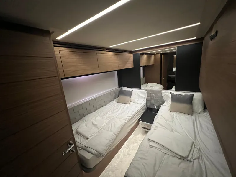 Slide: The Image of Luxurious twin cabin interior of 2017 Pershing 92 Motor Yacht with modern design. - 44
