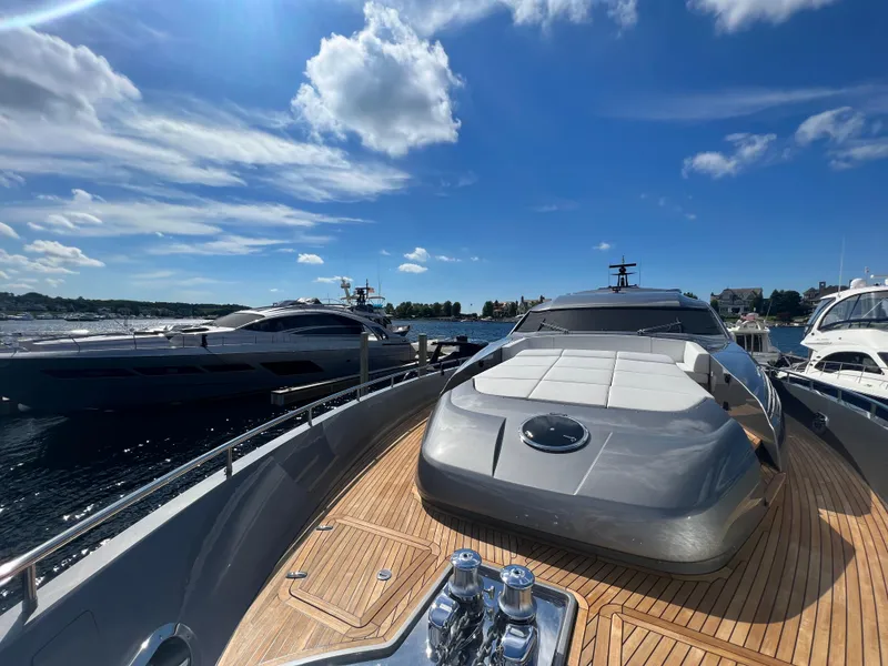 Slide: The Image of 2017 Pershing 92 Motor Yacht on sunny day, docked with clear blue sky. - 9
