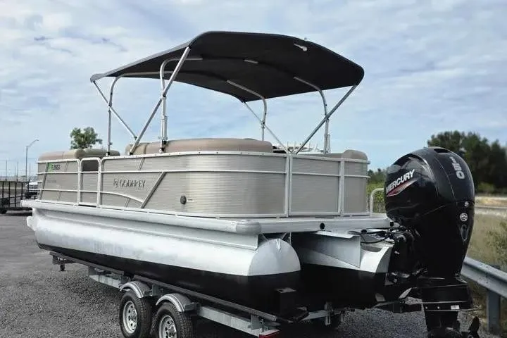 Slide: The Image of 2021 Godfrey Sweetwater 2086 BF pontoon boat on trailer with Mercury outboard motor. - 4