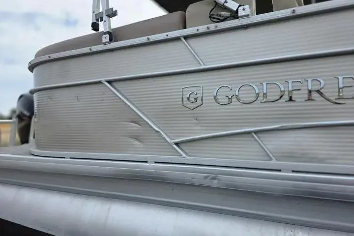 Slide: The Image of 2021 Godfrey Sweetwater 2086 BF pontoon boat, side view with logo and seating. - 7
