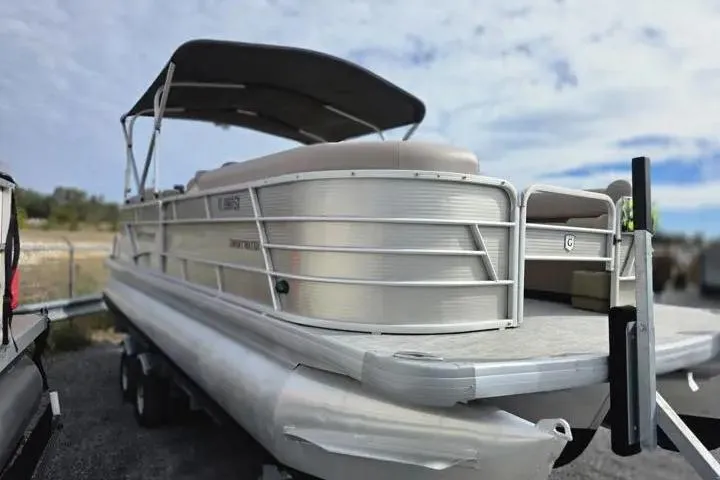 Slide: The Image of 2021 Godfrey Sweetwater 2086 BF pontoon boat with canopy, parked on a trailer. - 8