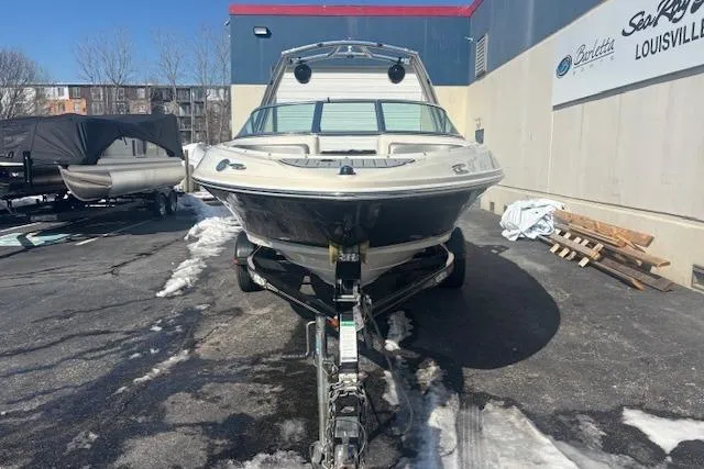 Slide: The Image of 2008 Sea Ray 205 Sport boat on trailer, parked outdoors in snowy area. - 4