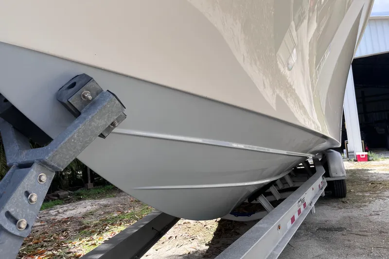 Slide: The Image of 2021 SeaVee 340B Open boat on trailer, side view showing hull design. - 12