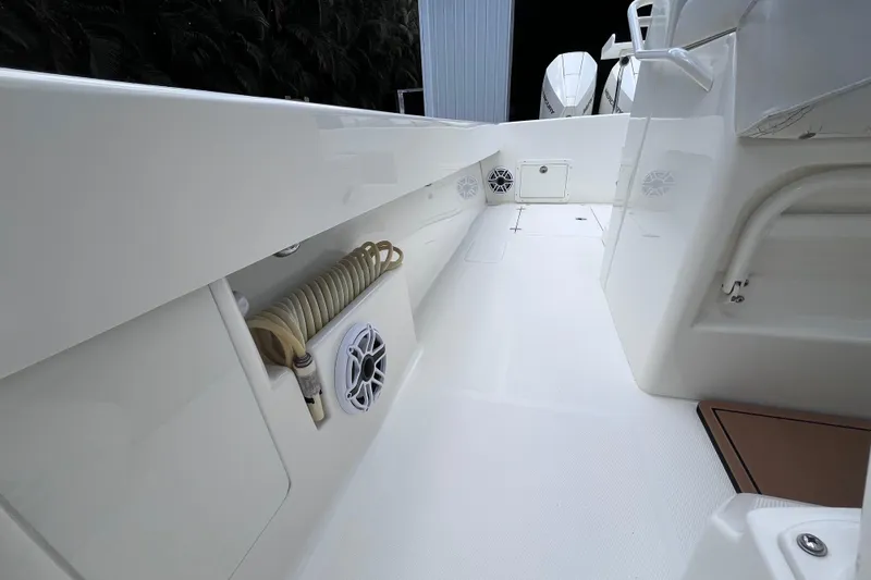 Slide: The Image of 2021 SeaVee 340B Open boat interior with storage and speakers. - 31