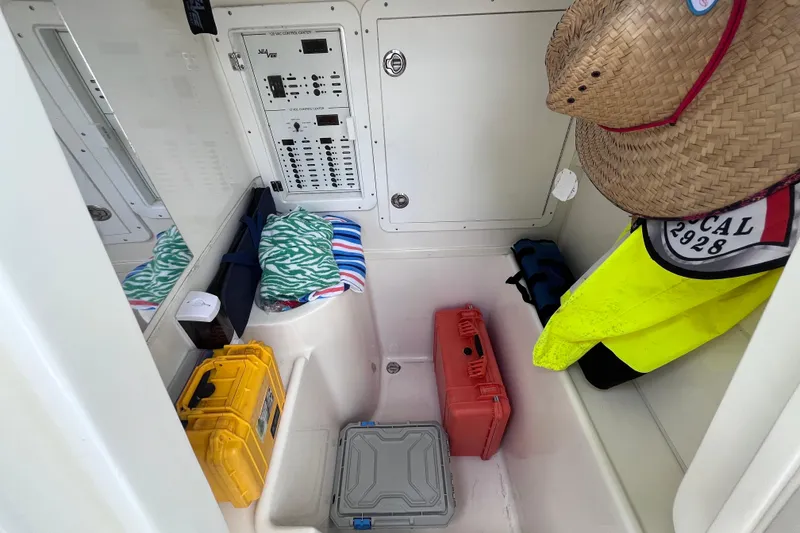 Slide: The Image of Interior of 2021 SeaVee 340B Open boat with storage and control panel. - 48