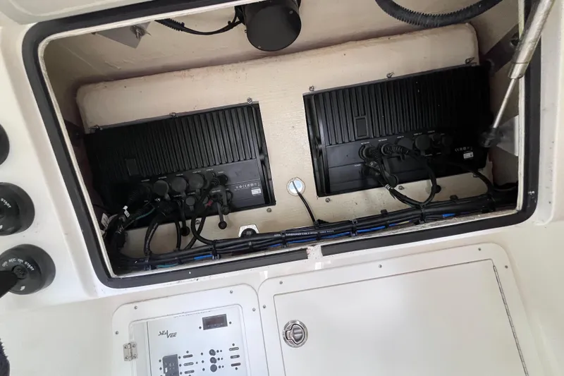Slide: The Image of 2021 SeaVee 340B Open boat electrical panel with wiring and components. - 50