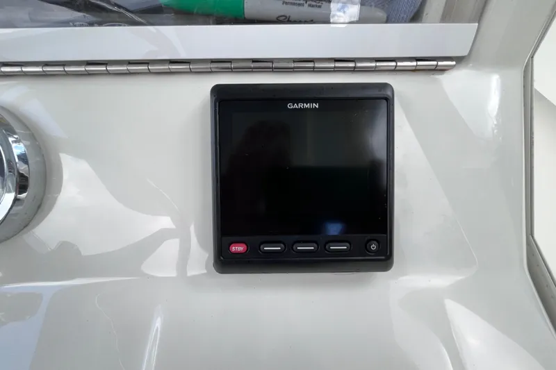 Slide: The Image of Garmin display on 2021 SeaVee 340B Open boat dashboard. - 55