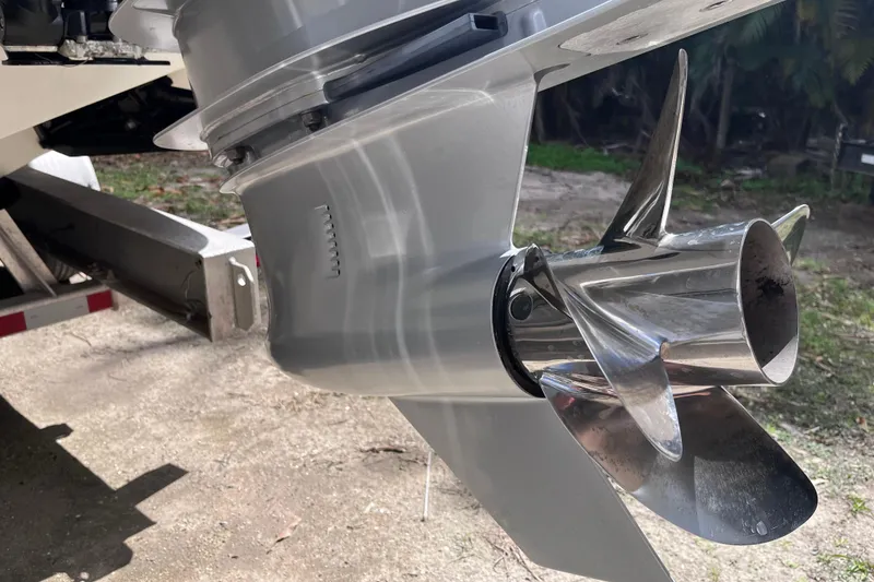 Slide: The Image of Close-up of a 2021 SeaVee 340B Open boat propeller and outboard motor. - 66