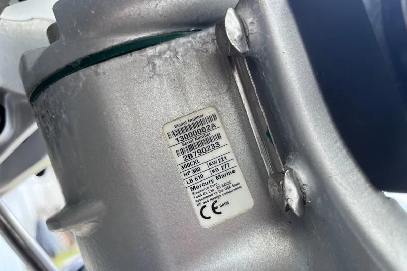 Slide: The Image of Close-up of a Mercury Marine engine label on a 2021 SeaVee 340B Open boat. - 70