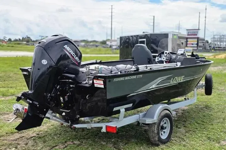 Slide: The Image of 2021 Lowe Fishing Machine 1775SC boat on trailer with Mercury outboard motor. - 24
