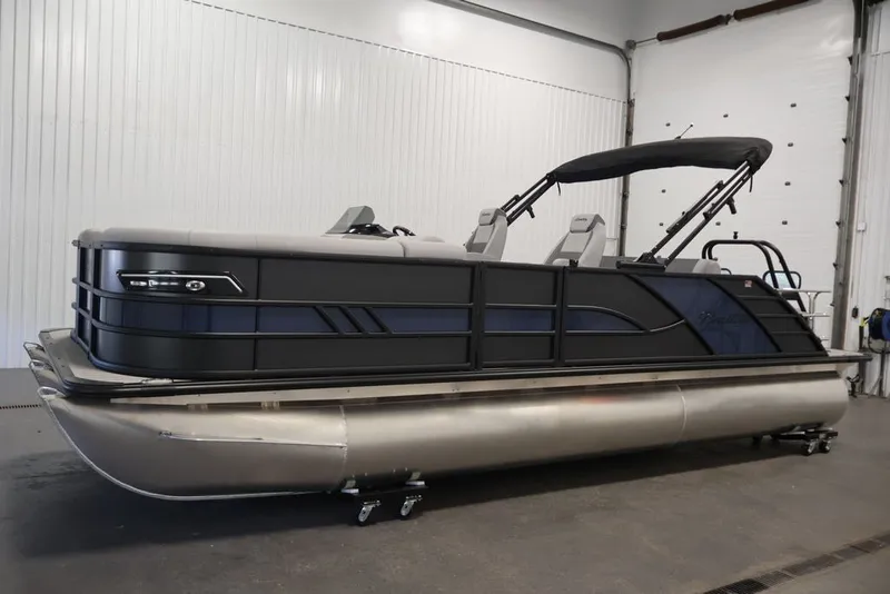 Slide: The Image of 2026 Bentley Pontoons 223 ELITE SWINGBACK DUAL CAPTAIN in a showroom, side view. - 13