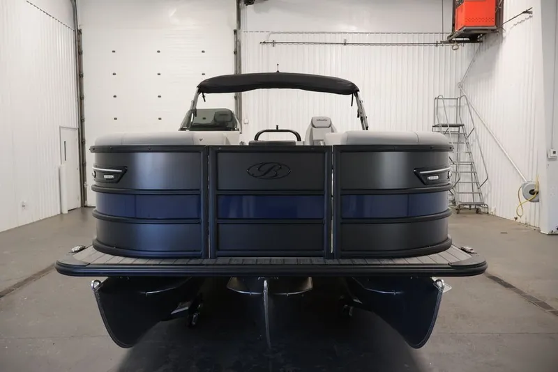 Slide: The Image of 2026 Bentley Pontoons 223 Elite Swingback Dual Captain in a showroom setting. - 9