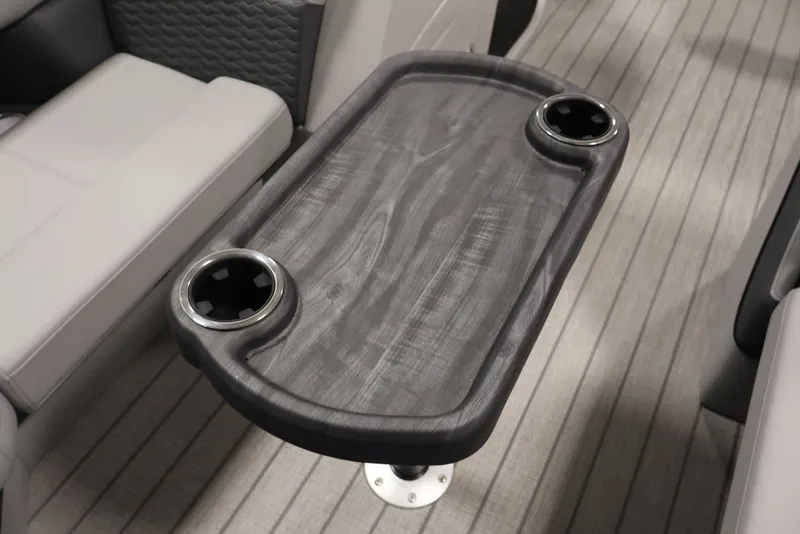 Slide: The Image of 2026 Bentley Pontoons 223 Elite Swingback Dual Captain table with cup holders. - 28