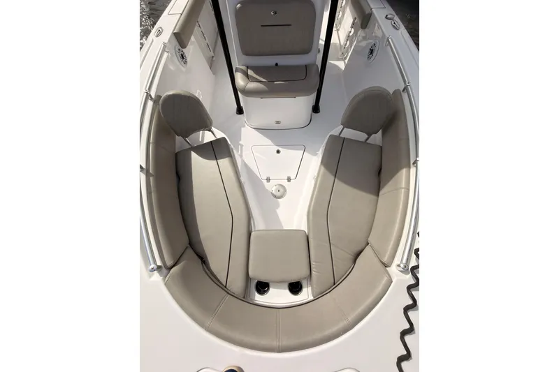 Slide: The Image of 2022 Sportsman Open 242 Center Console boat interior with cushioned seating. - 7