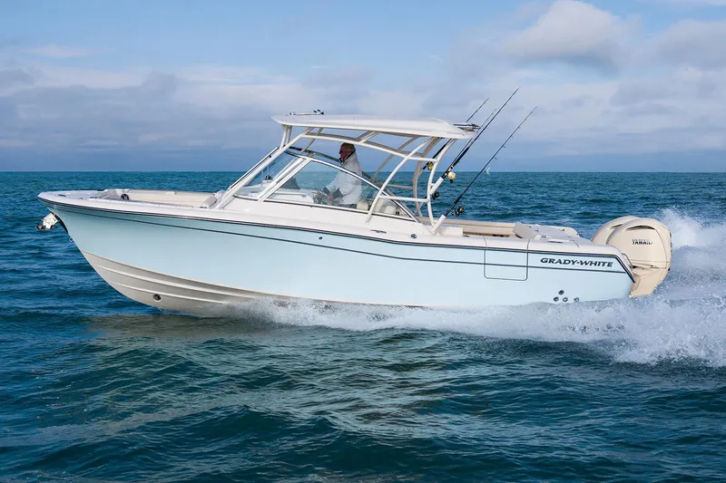 The Image of 2026 Grady-White Freedom 285 boat on trailer, parked outdoors. - 1