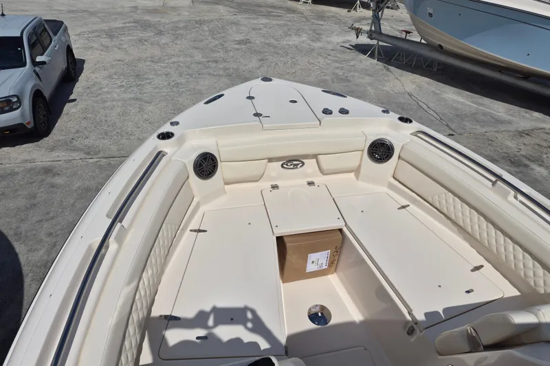 Slide: The Image of 2026 Grady-White Freedom 285 boat interior with seating and storage compartments. - 10