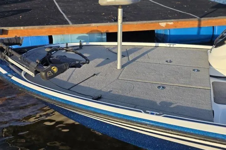 Slide: The Image of 2017 Nitro Z17 boat deck with mounted equipment at a dock. - 19