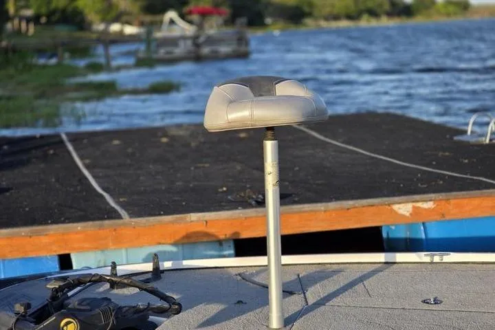 Slide: The Image of Fishing boat seat on a Nitro Z17, 2017 model, by a lakeside dock. - 20
