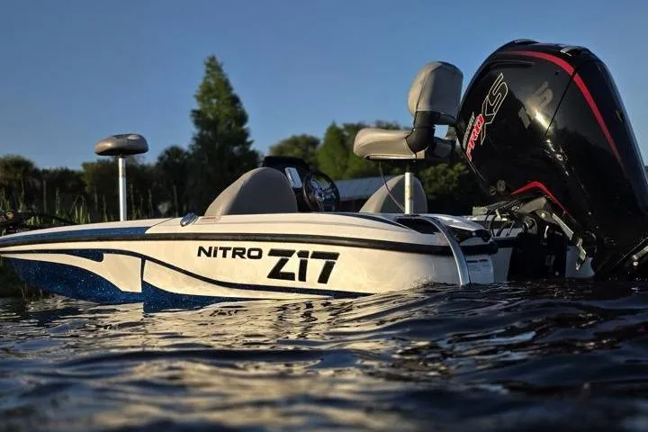 Slide: The Image of 2017 Nitro Z17 boat on water, featuring sleek design and powerful engine. - 22