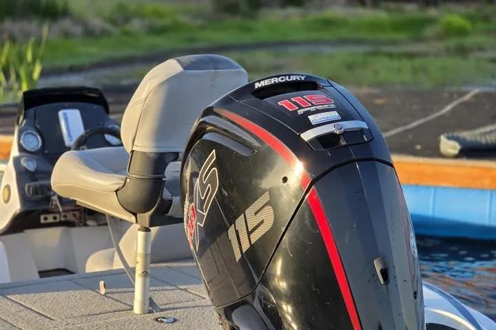 Slide: The Image of Boat with Mercury 115 engine, Nitro Z17 model, 2017, on a calm water setting. - 24