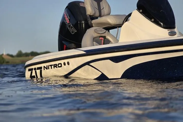 Slide: The Image of 2017 Nitro Z17 boat on water, showcasing sleek design and branding. - 28