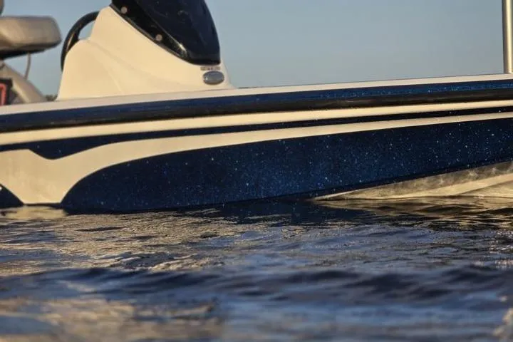 Slide: The Image of 2017 Nitro Z17 boat on water, showcasing sleek design and blue accents. - 29