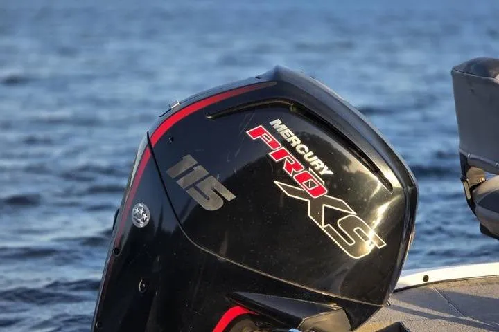 Slide: The Image of Mercury Pro XS 115 outboard motor on a 2017 Nitro Z17 boat, on water. - 30