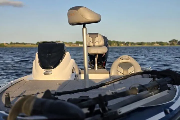 Slide: The Image of 2017 Nitro Z17 boat on water, featuring seating and control panel. - 36