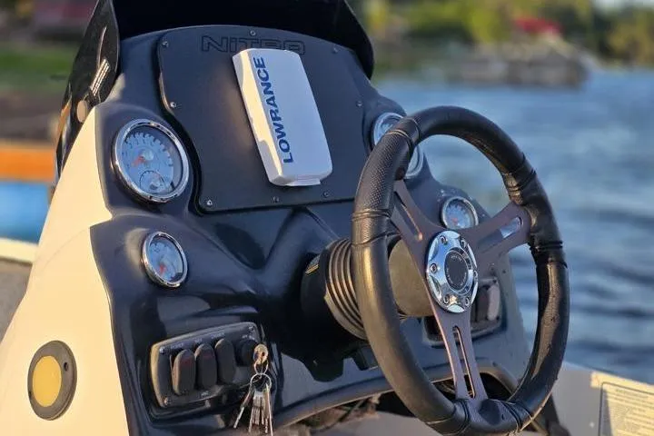 Slide: The Image of Steering console of a 2017 Nitro Z17 boat with Lowrance device. - 38