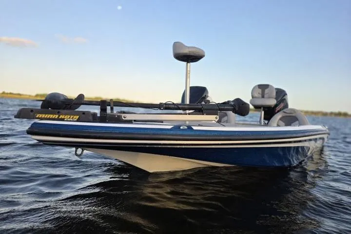Slide: The Image of 2017 Nitro Z17 boat on calm water, featuring a sleek blue design. - 40