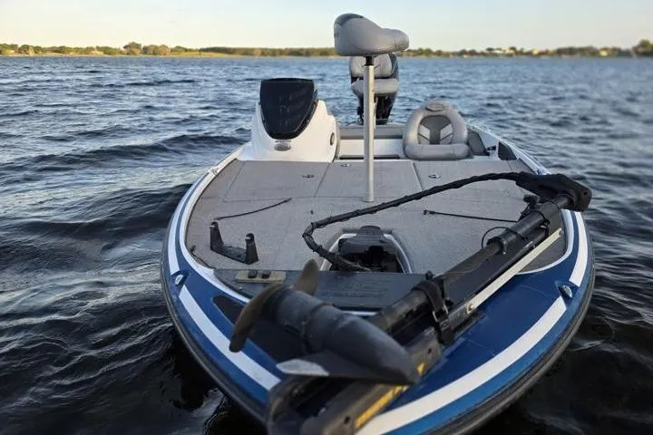 Slide: The Image of 2017 Nitro Z17 boat on a lake, featuring a sleek design and fishing equipment. - 42