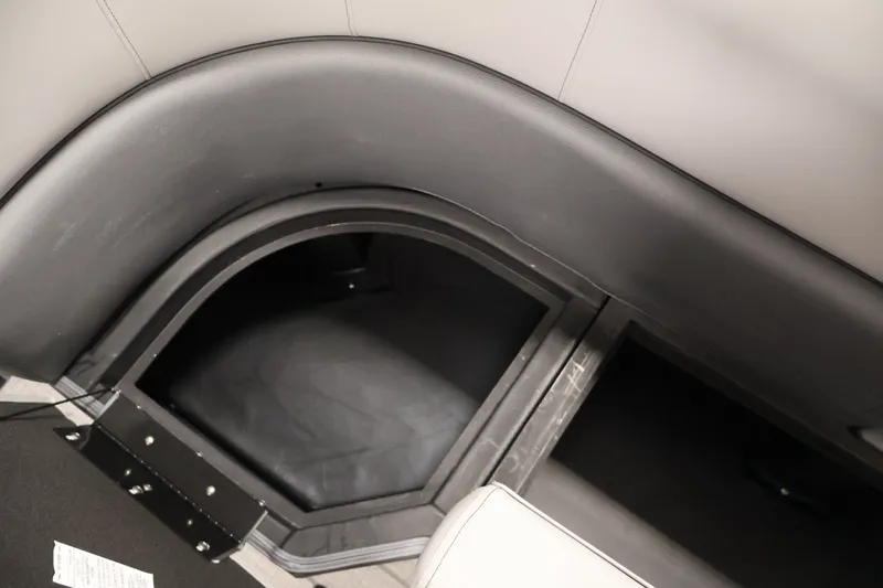 Slide: The Image of Interior storage compartment of 2026 Bentley Pontoons 253 Swingback Dual Captain Elite Tri-Toon. - 15