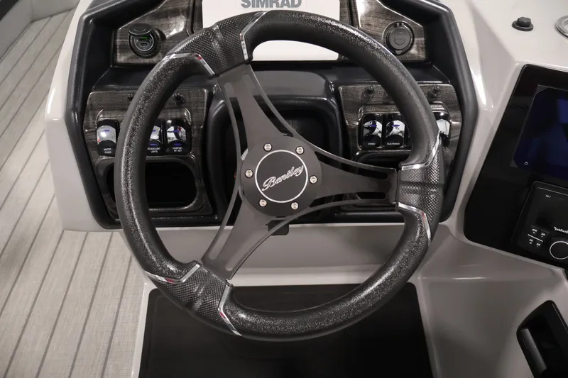 Slide: The Image of Steering wheel of 2026 Bentley Pontoons 253 Swingback Dual Captain Elite Tri-Toon. - 21