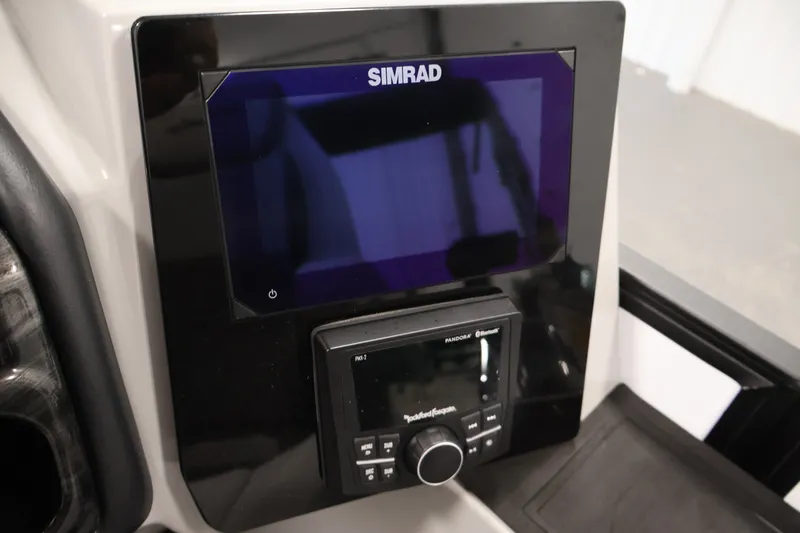 Slide: The Image of Simrad display and Rockford Fosgate audio system on 2026 Bentley Pontoons 253 Swingback. - 23