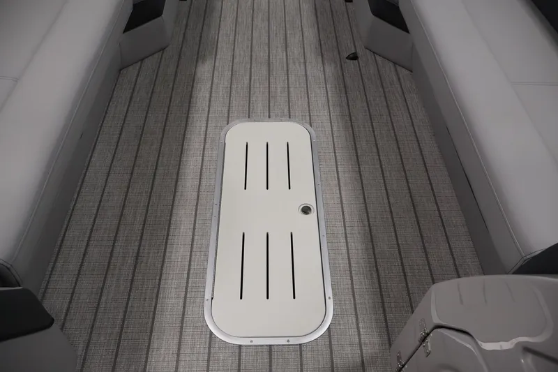 Slide: The Image of Interior of 2026 Bentley Pontoons 253 Swingback, featuring sleek flooring and seating. - 16