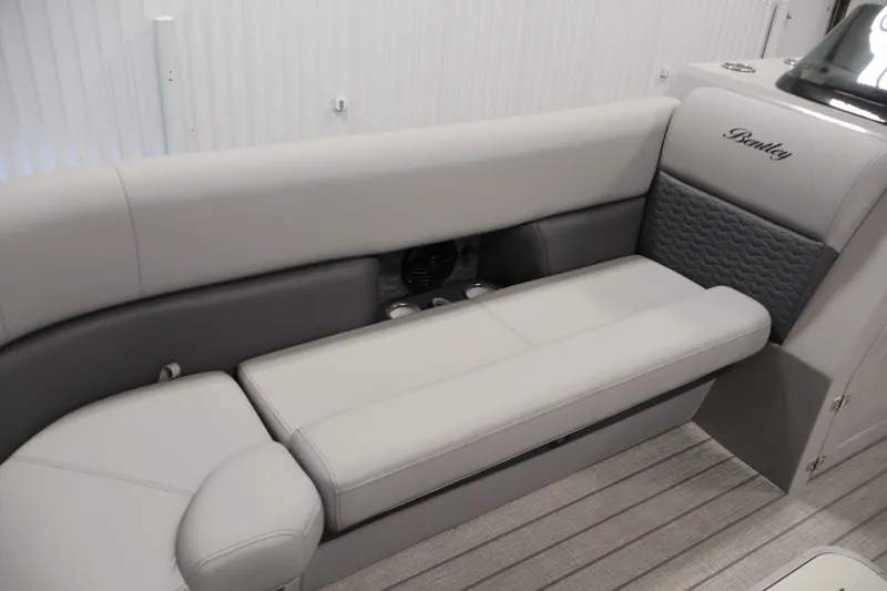 Slide: The Image of Luxurious seating in the 2026 Bentley Pontoons 253 Swingback Dual Captain Elite Tri-Toon. - 14