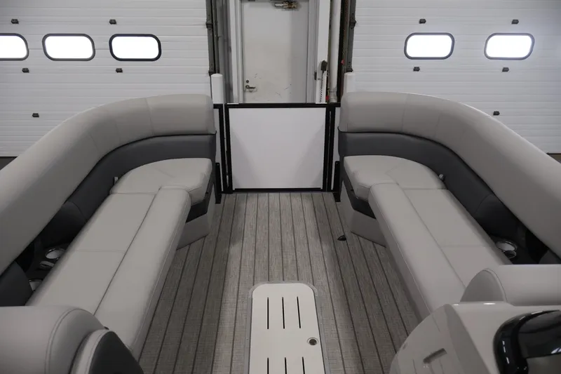 Slide: The Image of Interior of 2026 Bentley Pontoons 253 Swingback Dual Captain Elite Tri-Toon with plush seating. - 10