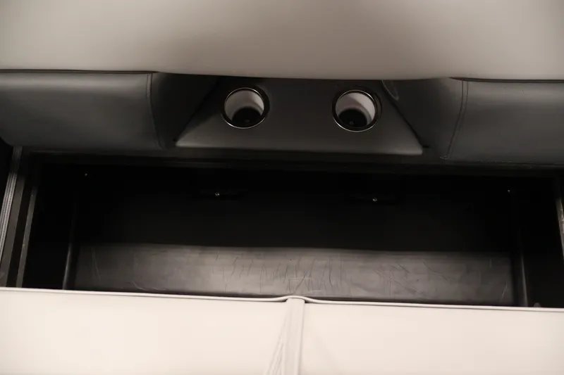 Slide: The Image of Interior storage compartment of 2026 Bentley Pontoons 253 Swingback Dual Captain Elite Tri-Toon. - 13