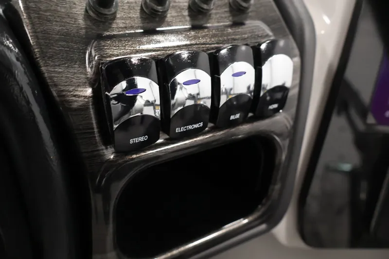 Slide: The Image of Control panel of 2026 Bentley Pontoons 253 Swingback Dual Captain Elite Tri-Toon. - 25