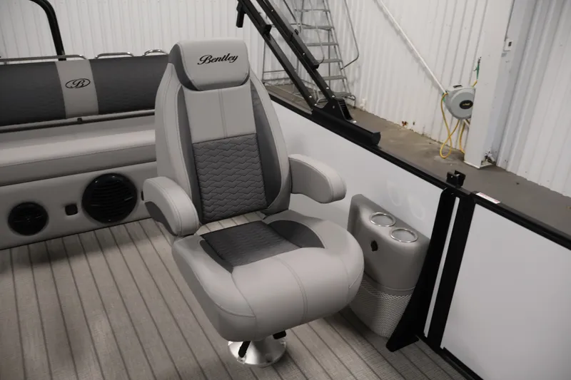 Slide: The Image of Luxurious captain's chair in 2026 Bentley Pontoons 253 Swingback Dual Captain Elite Tri-Toon. - 32